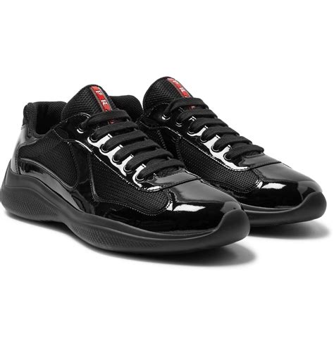 prada trainers black patent|prada black leather shoes.